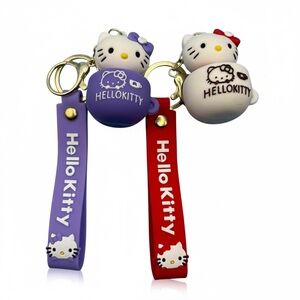 Hello Kitty in a teacup Keychains 2 Pcs - Purple and Red